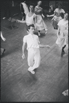 Peter Gennaro directing dancers during rehearsal for the stage production West Side Story