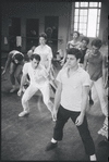 Peter Gennaro directing dancers during rehearsal for the stage production West Side Story
