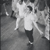Peter Gennaro directing Tony Mordente and dancers during rehearsal for the stage production West Side Story