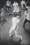 Peter Gennaro directing dancers during rehearsal for the stage production West Side Story