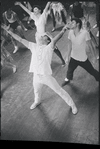 Peter Gennaro directing dancers during rehearsal for the stage production West Side Story