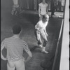 Jerome Robbins directing dancers in rehearsal for the stage production West Side Story
