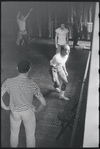 Jerome Robbins directing dancers in rehearsal for the stage production West Side Story
