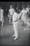 Peter Gennaro directing dancers in rehearsal for the stage production West Side Story