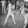 Peter Gennaro directing dancers in rehearsal for the stage production West Side Story