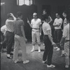 Jerome Robbins directing dancers in rehearsal for the stage production West Side Story