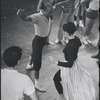 Jerome Robbins directing Chita Rivera and dancers in rehearsal for the stage production West Side Story
