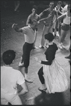 Jerome Robbins directing Chita Rivera and dancers in rehearsal for the stage production West Side Story
