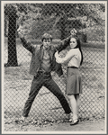 Victoria Mallory and Kurt Peterson by fence in Central Park [?] for After Dark Magazine