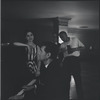 Carol Lawrence, Leonard Bernstein [at piano] and unidentified men during rehearsal for the stage production West Side Story