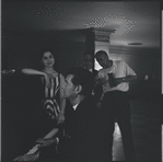 Carol Lawrence, Leonard Bernstein [at piano] and unidentified men during rehearsal for the stage production West Side Story
