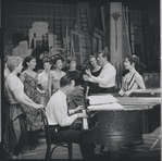 Stephen Sondheim (at piano), Leonard Bernstein, Carol Lawrence and other cast members during rehearsal for the stage production West Side Story