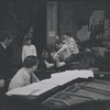 Dancers in rehearsal (Stephen Sondheim at piano[?]) for the stage production West Side Story