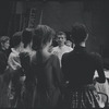 Leonard Bernstein and cast around piano in rehearsal for the stage production West Side Story