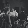 Leonard Bernstein surrounded by cast members during rehearsal for the stage production West Side Story