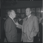 Robert E. Griffith and Roger L. Stevens at opening night party at Sardi's for the stage production West Side Story 