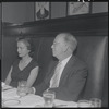 Unidentified woman and Robert E. Griffith at the opening night party at Sardi's for the stage production West Side Story