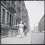 Carol Lawrence and Larry Kert on location (West 56th street between 9th and 10th ave) for West Side Story publicity shoot