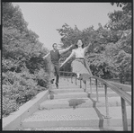 Larry Kert and Carol Lawrence on location in Central Park for publicity for the stage production West Side Story
