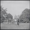 Larry Kert and Carol Lawrence on location in Central Park for publicity for the stage production West Side Story
