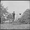 Larry Kert and Carol Lawrence on location in Central Park for publicity for the stage production West Side Story