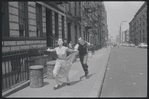 Carol Lawrence and Larry Kert on location (West 56th street between 9th and 10th ave) for West Side Story publicity shoot