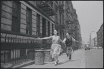 Carol Lawrence and Larry Kert on location (West 56th street between 9th and 10th ave) for West Side Story publicity shoot