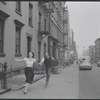 Carol Lawrence and Larry Kert on location (West 56th street between 9th and 10th ave) for West Side Story publicity shoot