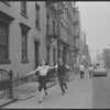 Carol Lawrence and Larry Kert on location (West 56th street between 9th and 10th ave) for West Side Story publicity shoot