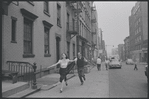Carol Lawrence and Larry Kert on location (West 56th street between 9th and 10th ave) for West Side Story publicity shoot