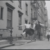 Carol Lawrence and Larry Kert on location (West 56th street between 9th and 10th ave) for West Side Story publicity shoot