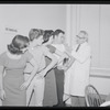 Unidentified actors receiving vaccinations in publicity photograph related to the stage production West Side Story