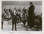 Jascha Heifetz playing violin in a scene from the motion picture Carnegie Hall