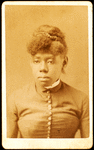 Portrait of unidentified young woman with buttoned bodice and band collar.