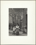 Untitled (two somber children; skyscraper background)