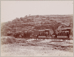 Mule train with passengers. Wagons read "Primera Classe. Ferro-Carril Tlaxcala"