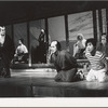Yuki Shimoda (arms out) and unidentified others in the stage production Pacific Overtures