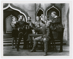 Richard Basehart, Jose Ferrer (Iago), Sam Banham, Eugene Stuckmann, two unidentified actors and James Monks (seated, as Cassio) in the stage production Othello