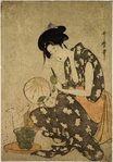 Mother Peeling Fruit While Child Watches