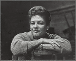 Ruth Mitchell portrait [arms folded]