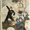 Japanese soldiers fire cannon at ship