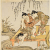 Boys sailing a toy boat in a small stream