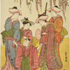 Women walking with a young boy under a wisteria arbor