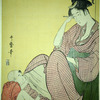 A mother playing with her small son