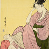 A mother playing with her small son