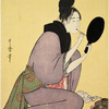 A woman at toilet engaged in painting her lips
