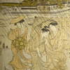 Women caught in a shower while crossing a bridge
