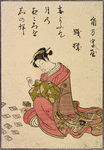 Lady playing card game (looking left)