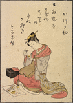 Seated lady sewing flowers