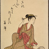 Seated lady fixing hair, fan on ground nearby